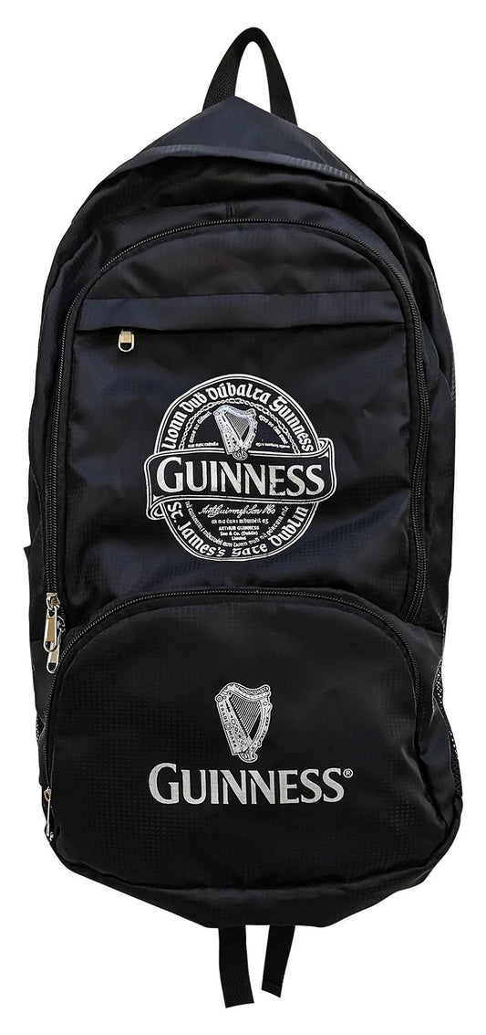 A black Guinness Fold Up Backpack with the Guinness logo on it.